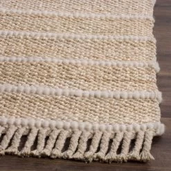 Nita Solid Woven Rug - Safavieh