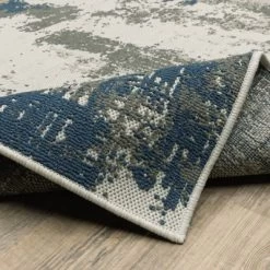 Trinity Modern Distressed Abstract Patio Area Rug Beige/Blue - Captiv8e Designs -Rug Sales Store GUEST 69bea875 354f 4e79 a476 91f7657dc401