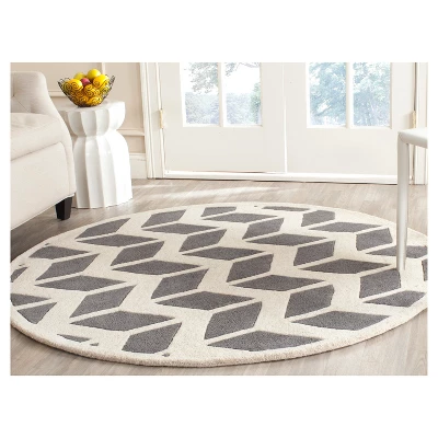 Kenan Solid Tufted Accent Rug - Safavieh 2 Kenan Solid Tufted Accent Rug - Safavieh - Image 2
